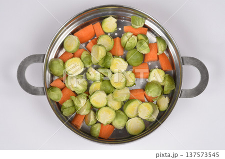 Brussels Sprouts and Carrots in Steamer Pot Brussels Sprouts and Carrots in Steamer Pot 137573545