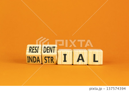 Industrial or residential symbol. Concept words Industrial or Residential on beautiful wooden blocks. Beautiful orange background. Business industrial or residential concept. Copy space. Industrial or residential symbol. Concept words Industrial or Residential on beautiful wooden blocks. Beautiful orange background. Business industrial or residential concept. Copy space. 137574394
