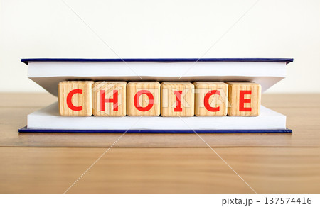 Choice symbol. Concept word Choice on beautiful wooden blocks in beautiful book. Beautiful wooden table white background. Business choice concept. Copy space. Choice symbol. Concept word Choice on beautiful wooden blocks in beautiful book. Beautiful wooden table white background. Business choice concept. Copy space. 137574416
