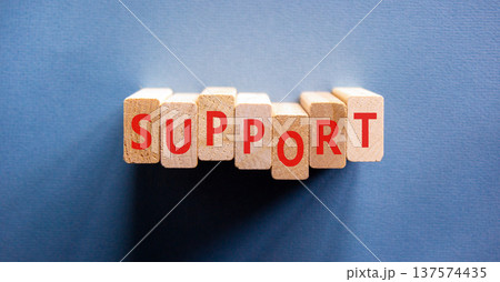 Support help word symbol. Concept word Support on beautiful wooden blocks. Beautiful blue background. Business support help word concept. Copy space. Support help word symbol. Concept word Support on beautiful wooden blocks. Beautiful blue background. Business support help word concept. Copy space. 137574435