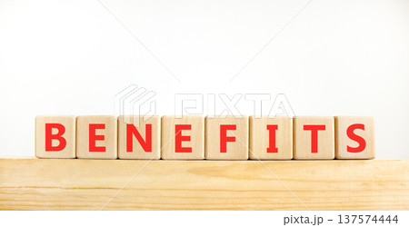 Benefits word symbol. Concept word Benefits on beautiful wooden blocks on wooden beam. Beautiful white background. Business support help benefits word concept. Copy space. Benefits word symbol. Concept word Benefits on beautiful wooden blocks on wooden beam. Beautiful white background. Business support help benefits word concept. Copy space. 137574444
