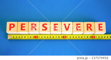 Persevere symbol. Concept word Persevere on beautiful wooden blocks. Beautiful blue background. Beautiful yellow ruler. Business education support persevere concept. Copy space. Persevere symbol. Concept word Persevere on beautiful wooden blocks. Beautiful blue background. Beautiful yellow ruler. Business education support persevere concept. Copy space. 137574458