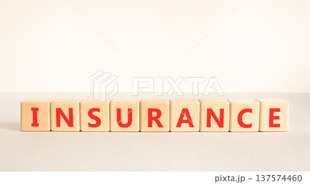 Insurance symbol. Concept words Insurance on beautiful wooden blocks. Beautiful white and grey background. Business support medical insurance concept. Copy space. 137574460