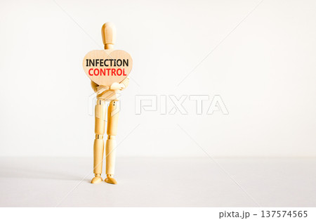 Infection control symbol. Concept words Infection control on beautiful wooden heart. Doctor's model. Beautiful white background. Copy space. Medical healthy lifestyle infection control concept. Infection control symbol. Concept words Infection control on beautiful wooden heart. Doctor's model. Beautiful white background. Copy space. Medical healthy lifestyle infection control concept. 137574565