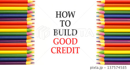 How to build good credit symbol. Concept words How to build good credit on beautiful white paper. Beautiful white background. Colored pencils. Business how to build good credit concept. Copy space. How to build good credit symbol. Concept words How to build good credit on beautiful white paper. Beautiful white background. Colored pencils. Business how to build good credit concept. Copy space. 137574585