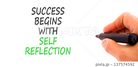 Self reflection symbol. Concept words Success begins with self reflection on beautiful white paper. Beautiful white background. Business success begins with self reflection concept. Copy space. 137574592