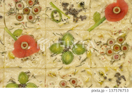 Focaccia art with vegetable flower patterns Focaccia art with vegetable flower patterns 137576753