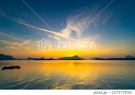 Nature beautiful Light Sunset or sunrise over sea, Colorful dramatic scenery Sky with Amazing clouds and waves in sunset sky nature light cloud background 137577050