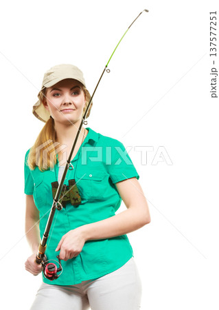 Woman with fishing rod, spinning equipment Woman with fishing rod, spinning equipment 137577251