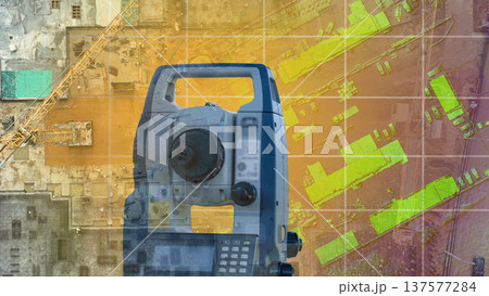 Modern surveyor's device on the background of the drawing. Surveying equipment construction 137577284