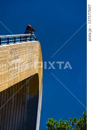 Tourist take photo on Stegastein viewpoint Norway Tourist take photo on Stegastein viewpoint Norway 137577607