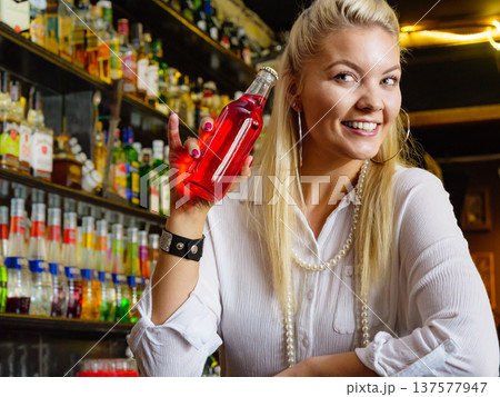 Woman working at the bar counter Woman working at the bar counter 137577947