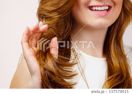 Woman long healthy brown hair ends, detail view Woman long healthy brown hair ends, detail view 137578015