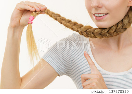 Blonde girl with braid hair Blonde girl with braid hair 137578539