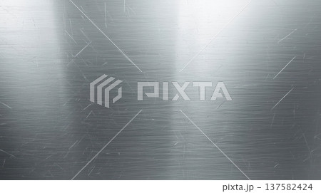 Shiny brushed metal surface reflects light, showing subtle scratches and linear texture on the smooth industrial material background close up view. Shiny brushed metal surface reflects light, showing subtle scratches and linear texture on the smooth industrial material background close up view. 137582424