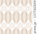 Soft Beige and Cream Watercolor Ikat Seamless Pattern with Symmetrical Ornamental Motifs 137582849