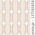 Soft Beige and Cream Watercolor Ikat Seamless Pattern with Symmetrical Ornamental Motifs 137582858