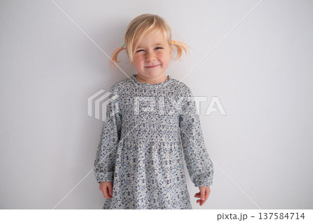 Portrait of a Smiling 4 Year Old Blonde Girl 137584714