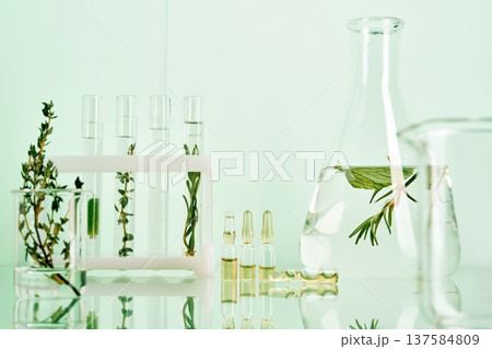 Natural herbal extracts creating alternative medicine ingredients in laboratory 137584809