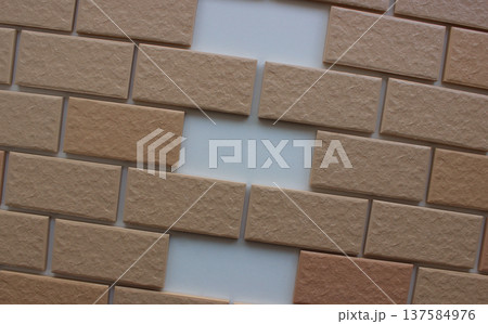 Three same empty niches in even rows of wall tiles with imitation bricks. Stock image for illustration of home renovation Three same empty niches in even rows of wall tiles with imitation bricks. Stock image for illustration of home renovation 137584976