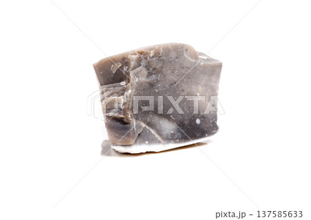 Macro mineral stone Flint in the rock on a white background 137585633