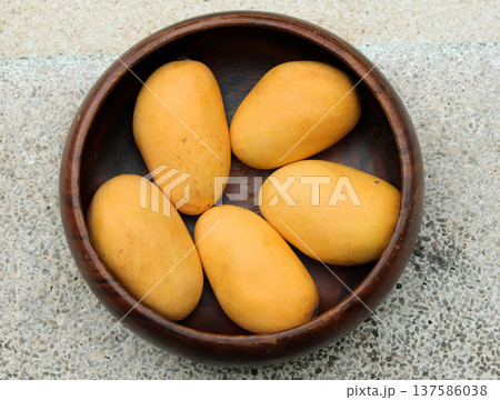 ripe mango in a bowl ripe mango in a bowl 137586038