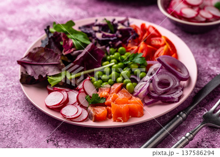 Ketogenic bowl with vegetables and salmon 137586294