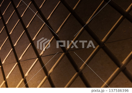 Repeating geometric pattern on an architectural wall Repeating geometric pattern on an architectural wall 137586396