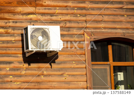 air conditioning on facade of building, air cooling in hot weather.  137588149