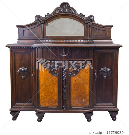 Vintage wooden cabinet showcasing ornate design and rich color with mirrored back, perfect for enhancing interior decor in any home setting Vintage wooden cabinet showcasing ornate design and rich color with mirrored back, perfect for enhancing interior decor in any home setting 137590294