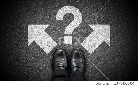 Black business shoes, two arrows and question mark - problem concept Black business shoes, two arrows and question mark - problem concept 137590604