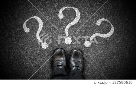 Black business shoes and three question marks - problem concept Black business shoes and three question marks - problem concept 137590616