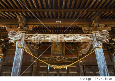Sakata, Yamagata, japan - Oct 5 2024, A close-up view of the carved wooden interior elements in form of dragon head located under the roof vaults of the Jinchi-ji Temple, Sakata, Japan 137591056