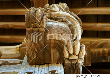 Sakata, Yamagata, japan - Oct 5 2024, A close-up view of the carved wooden interior elements in form of lion head located under the roof vaults of the Jinchi-ji Temple, Sakata, Japan 137591060