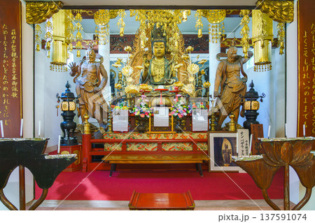 Sakata, Yamagata, japan - Oct 5 2024, A panoramic view of a Buddhist altar with various statues and a many of gilded decorations in the main hall of Jichi-in Temple, without people, Sakata, Japan Sakata, Yamagata, japan - Oct 5 2024, A panoramic view of a Buddhist altar with various statues and a many of gilded decorations in the main hall of Jichi-in Temple, without people, Sakata, Japan 137591074