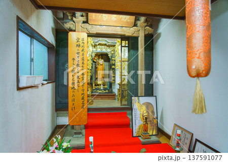 Sakata, Yamagata, japan - Oct 5 2024, A panoramic view of a Buddhist altar with various statues and a many of gilded decorations in the main hall of Jichi-in Temple, without people, Sakata, Japan Sakata, Yamagata, japan - Oct 5 2024, A panoramic view of a Buddhist altar with various statues and a many of gilded decorations in the main hall of Jichi-in Temple, without people, Sakata, Japan 137591077