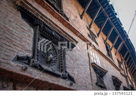 Beautiful peacock window also referred to as the Mona Lisa of Nepal adorns the Pujari Math in Bhaktapur, Nepal. 137593121