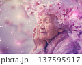 Old woman in cherry blossom garden, memories of youth and romance 137595917