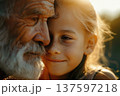 Family care concept with grandfather hugging his granddaughter closely. 137597218