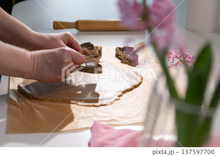 Cooking Gingerbread Cookies for Easter Celebration With Preparations and Ingredients Present 137597700