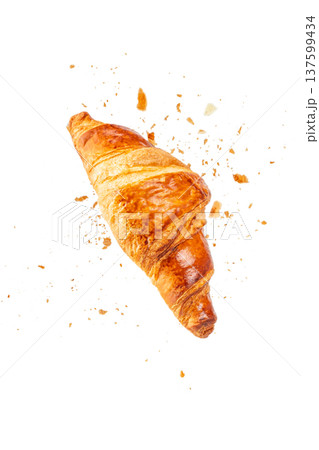 Fresh croissant with crumbs isolated on white background Fresh croissant with crumbs isolated on white background 137599434