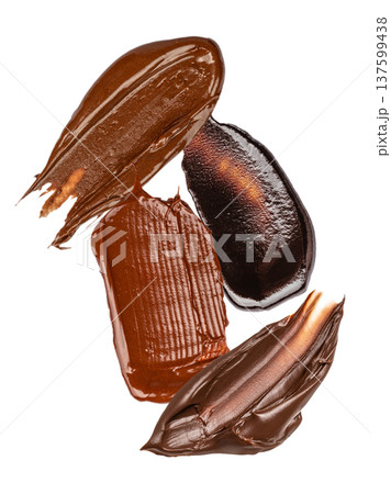 Chocolate spread smears isolated on white background 137599438