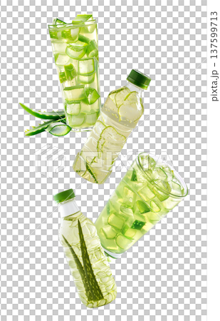 Multiple glasses and bottles with green aloe drink and cubes isolated on white background, concept of freshness Multiple glasses and bottles with green aloe drink and cubes isolated on white background, concept of freshness 137599713