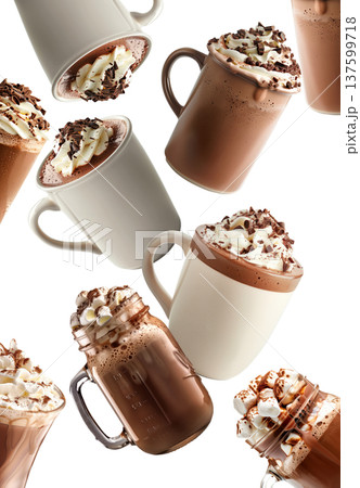Hot chocolate drinks in various mugs with whipped cream isolated on white background showing warm beverage concept 137599718