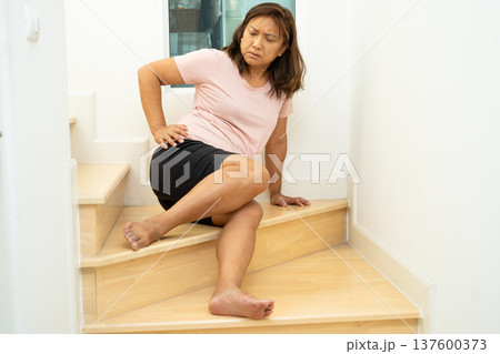 Asian lady woman patient fall down the stairs because slippery surfaces. 137600373