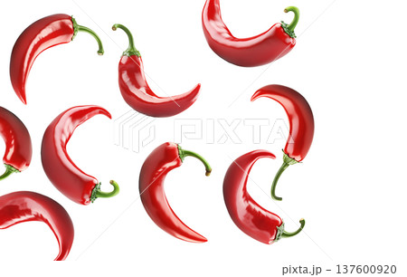 Red chili peppers arranged, isolated on white background, concept of spicy cooking ingredient Red chili peppers arranged, isolated on white background, concept of spicy cooking ingredient 137600920