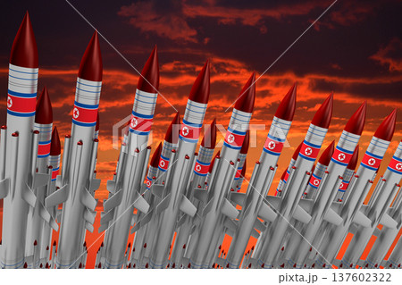 Missiles with North Korea flags and sunset sky in background 137602322