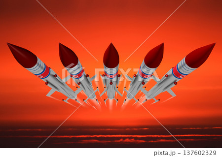 Missiles with North Korea flags flying in the air Missiles with North Korea flags flying in the air 137602329