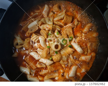This is Korean style tteokbokki being boiled in a pot. This is Korean style tteokbokki being boiled in a pot. 137602462