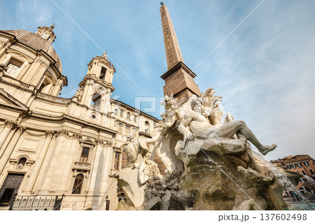 Fountain of the Four Rivers statue and Sant Agnese in Agone church in Rome Italy Fountain of the Four Rivers statue and Sant Agnese in Agone church in Rome Italy 137602498